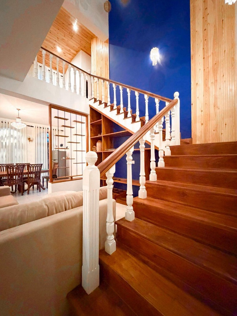 Villa 44 Badulla living area and wooden staircase